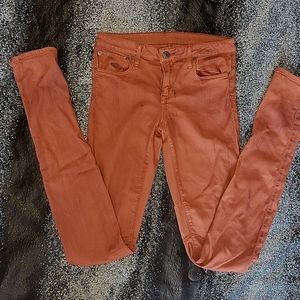 Helmut Lang rust orange/red jeans w/burnt splatter detail